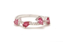 A RUBELLITE AND DIAMOND RING