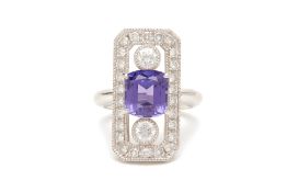 AN ART DECO STYLE TANZANITE AND DIAMOND PLAQUE RING