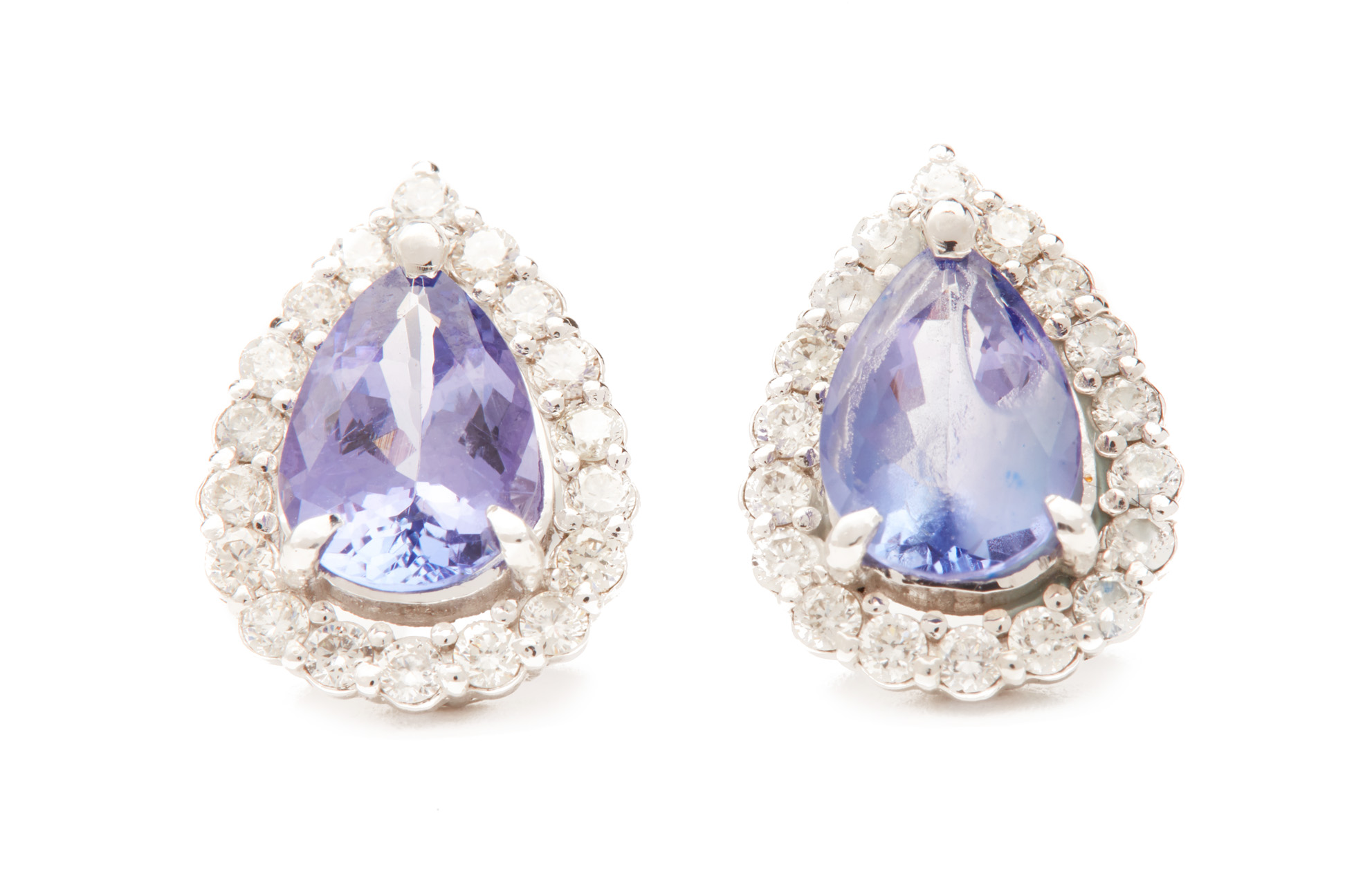 A PAIR OF TANZANITE AND DIAMOND STUD EARRINGS