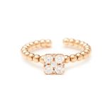 A 18K ROSE GOLD AND DIAMOND RING