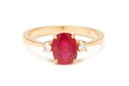 A BURMESE RUBY AND DIAMOND THREE STONE RING