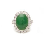 A GREEN JADE AND DIAMOND CLUSTER RING