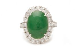 A GREEN JADE AND DIAMOND CLUSTER RING