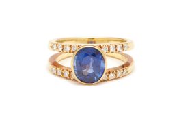 A SAPPHIRE AND DIAMOND RING