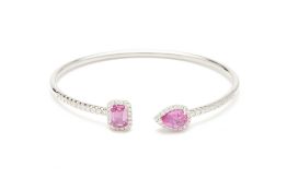 AN 18K WHITE GOLD PINK SAPPHIRE AND DIAMOND BANGLE