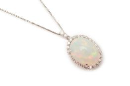 AN AUSTRALIAN FIRE OPAL AND DIAMOND PENDANT ON CHAIN