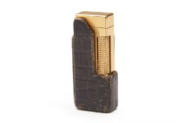 A VINTAGE DUNHILL GOLD PLATED LIGHTER