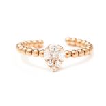 A 18K ROSE GOLD AND DIAMOND RING