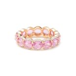 A PINK SAPPHIRE AND DIAMOND ETERNITY RING