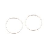 A PAIR OF DIAMOND HOOP EARRINGS