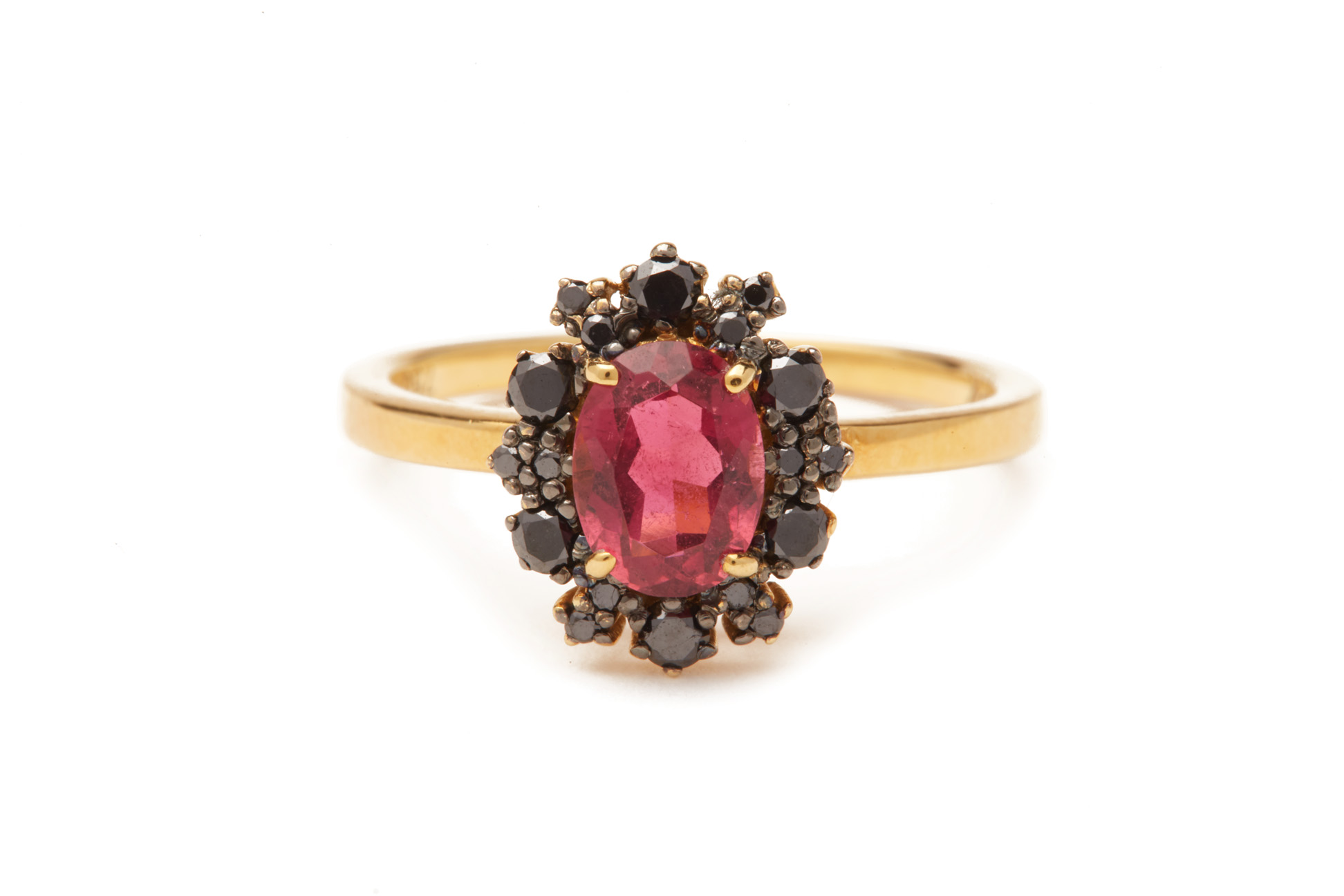 A RUBELLITE AND BLACK DIAMOND CLUSTER RING