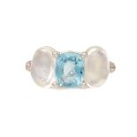 AN AQUAMARINE AND MOONSTONE THREE STONE RING