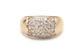 A GOLD PAVE SET DIAMOND BOMBE RING