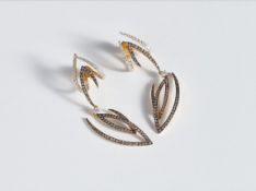 TRANSFORMABLE EARRINGS WITH YELLOW AND BLACK DIAMONDS