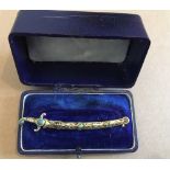 Vintage Boxed Yellow Metal Sword Brooch set with stones- 85mm long.