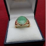 9ct gold ring set with Jade. Size I 1/2. Marked with year letter for 1996. 4.70 grams. The cost of