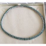 A Silver Articulated Natural Emerald 3 Row Necklace - 18" in length.