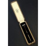 Boxed Carrington & Co Edwardian gold and diamond stick pin - 1912. 7cm long - 1.8 grams.