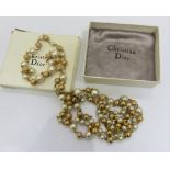 Signed Christian Dior by Mitchel Maer double strand metal and faux pearl necklace – 30 Inches long.