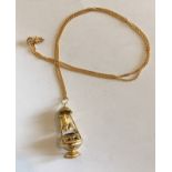 Vintage 9 carat Gold Pot Pendant (30mm tall) set on an 17" Gold Chain - total weight 5.65 grams.