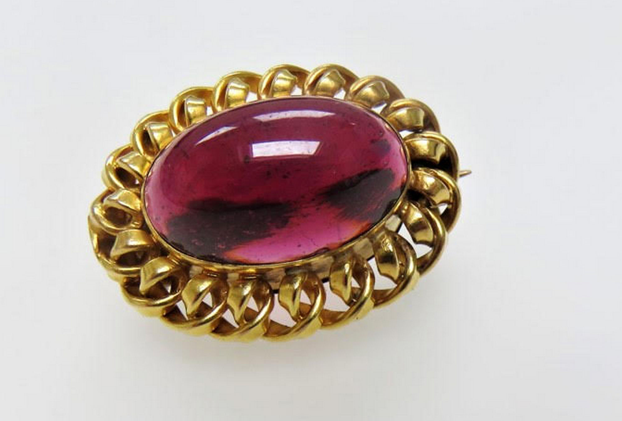 Victorian yellow metal and garnet brooch (tests as 18ct)-secret compartment at back of brooch.