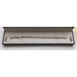 9 karat Gold and Diamond Tennis Bracelet with matching Earrings - 18.5cm long -7.5g total weight.