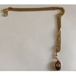 Antique/Vintage 9ct Gold 54" long Chain (31 grams) on a Yellow Metal Locket (6.7 grams).
