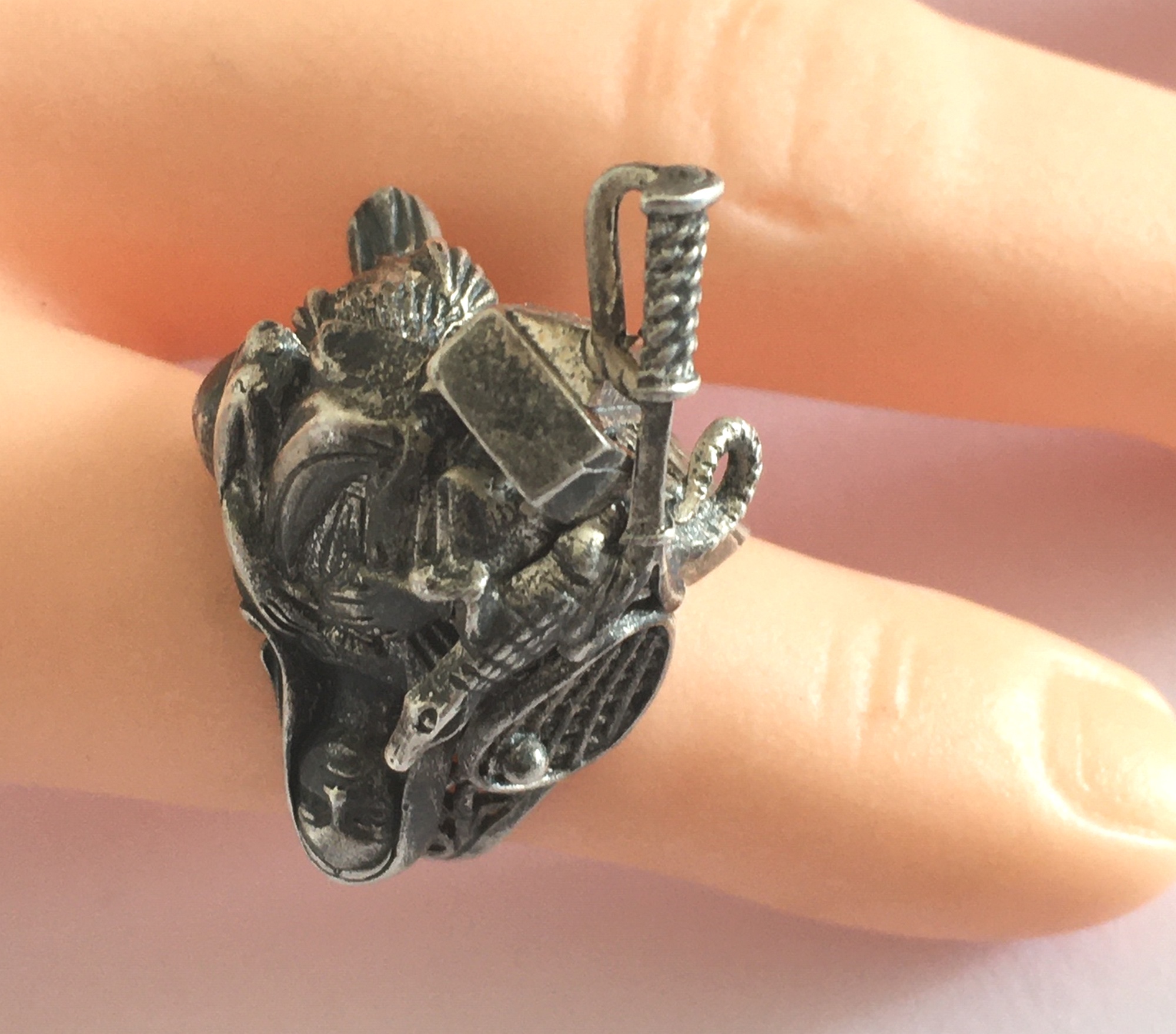 Vintage Modernist Silver Ring depicting Religion, Sport, Animals marked NSS.