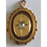 Antique Yellow Metal Locket 22mm x 12mm set with an approx 4mm Diamond - 3.35 grams.