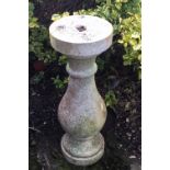 Granite pedestal 30" tall with top 10" diameter.