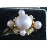 Vintage 18 karat Gold Pearl and Diamond Ring - UK size P with London Hallmarks - 6.4 grams.