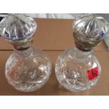 Pair of Vintage Silver Collared Crystal Decanter 9 3/4" tall and 5 1/2" at the widest.