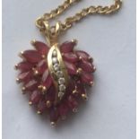 Vintage 9ct Gold and Gemstone Pendant (20mm x 16mm) with a 17" 9ct Gold Chain. - 3.81 grams.