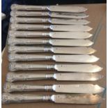 Garrard&Co Ltd Silver Fish Knives (set of 12) - 8.7" - 800 grams weight.