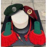 Lot of headgear, and uniform insignia of the 2nd Rep Parachute Regiment, French Foreign Legion.