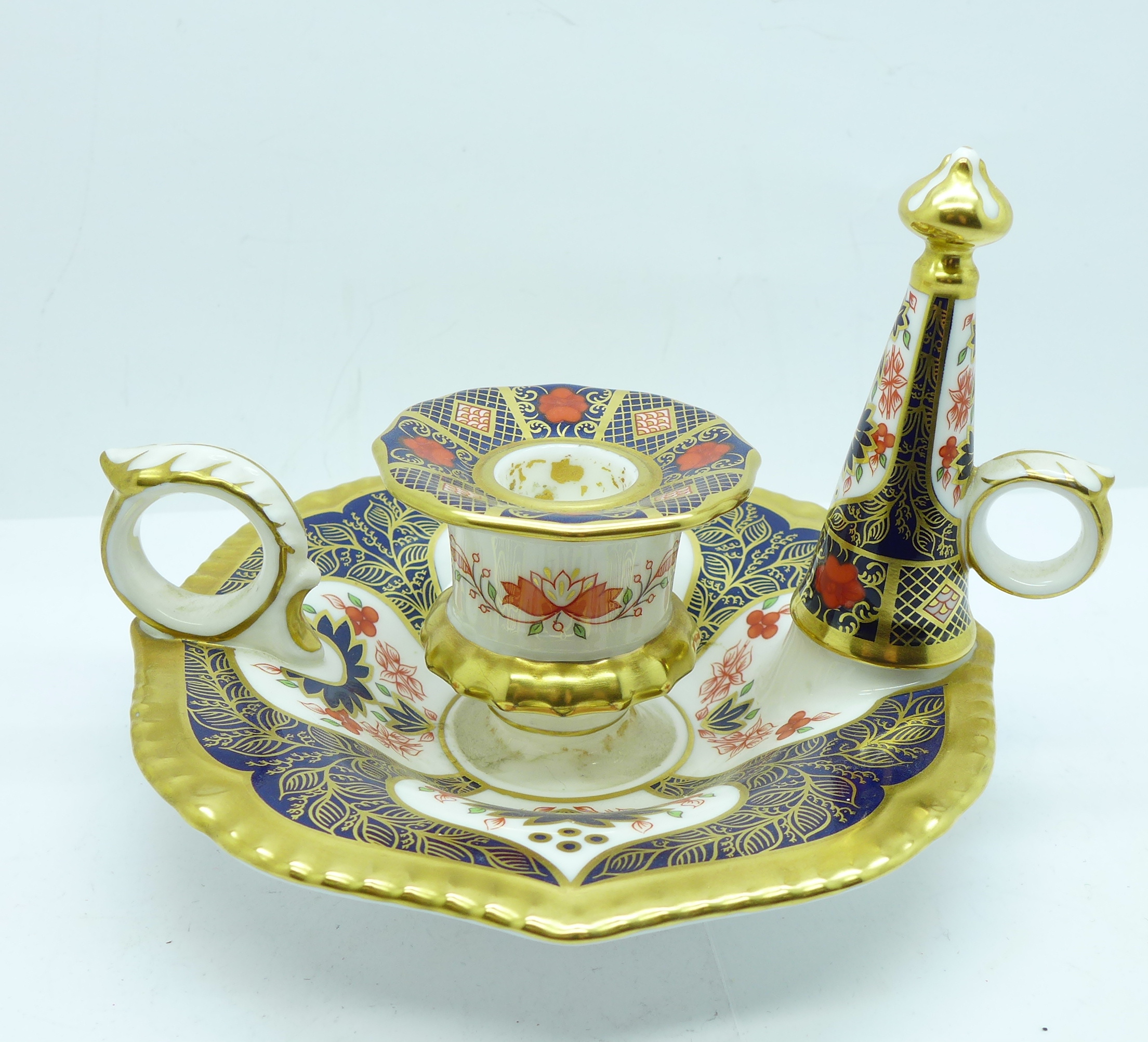 A Royal Crown Derby Old Imari pattern candlestick and snuffer, boxed