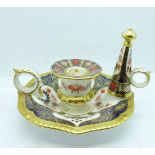 A Royal Crown Derby Old Imari pattern candlestick and snuffer, boxed