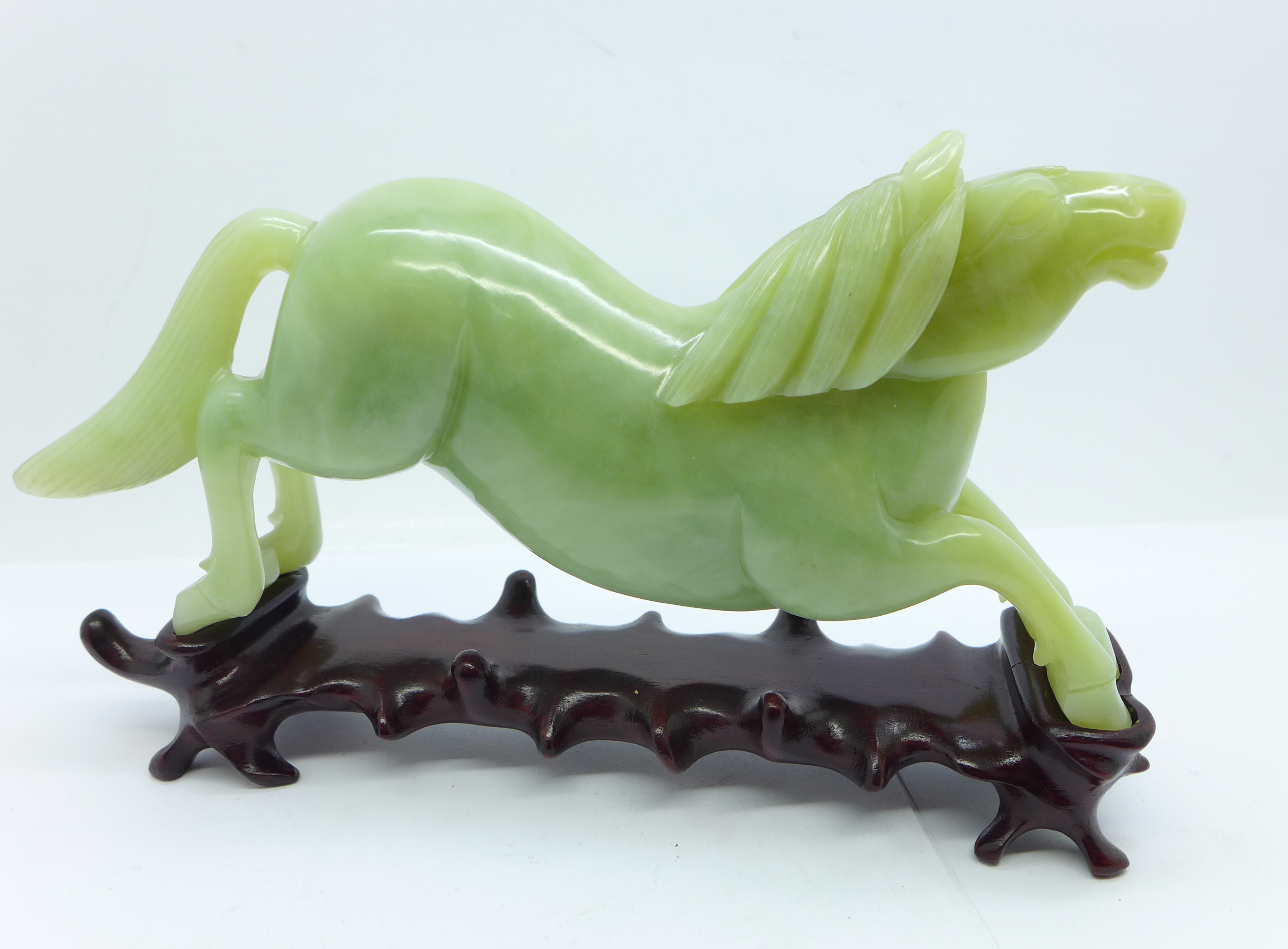 A Chinese carved jade figure of a horse, 18.5cm, on a wooden stand - Image 3 of 3