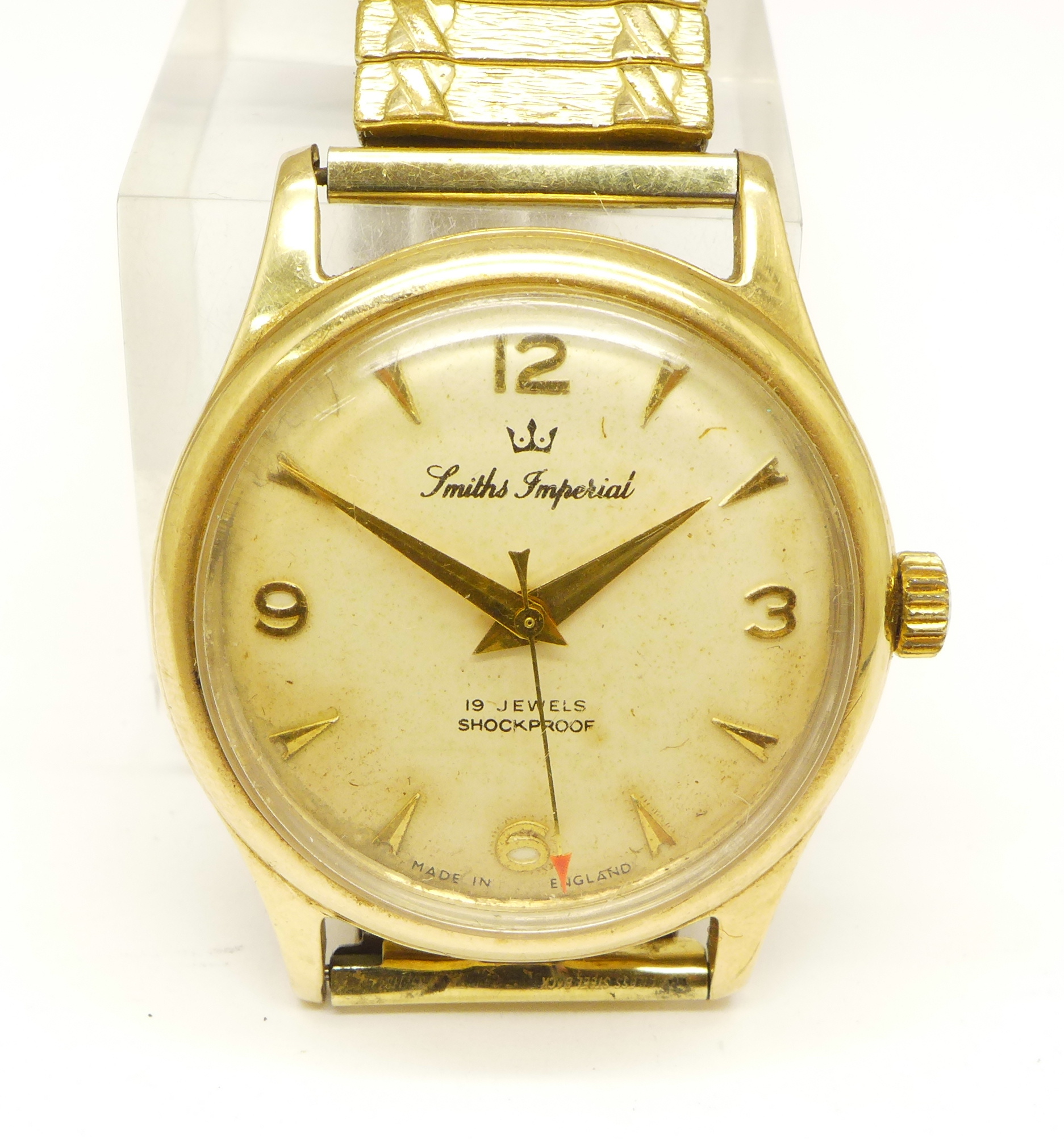 A 9ct gold cased Smiths Imperial wristwatch, the case back bears ...