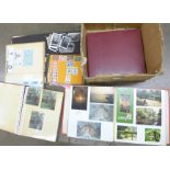 Photograph albums, including black and white photographs, an album of cigarette packets, etc.