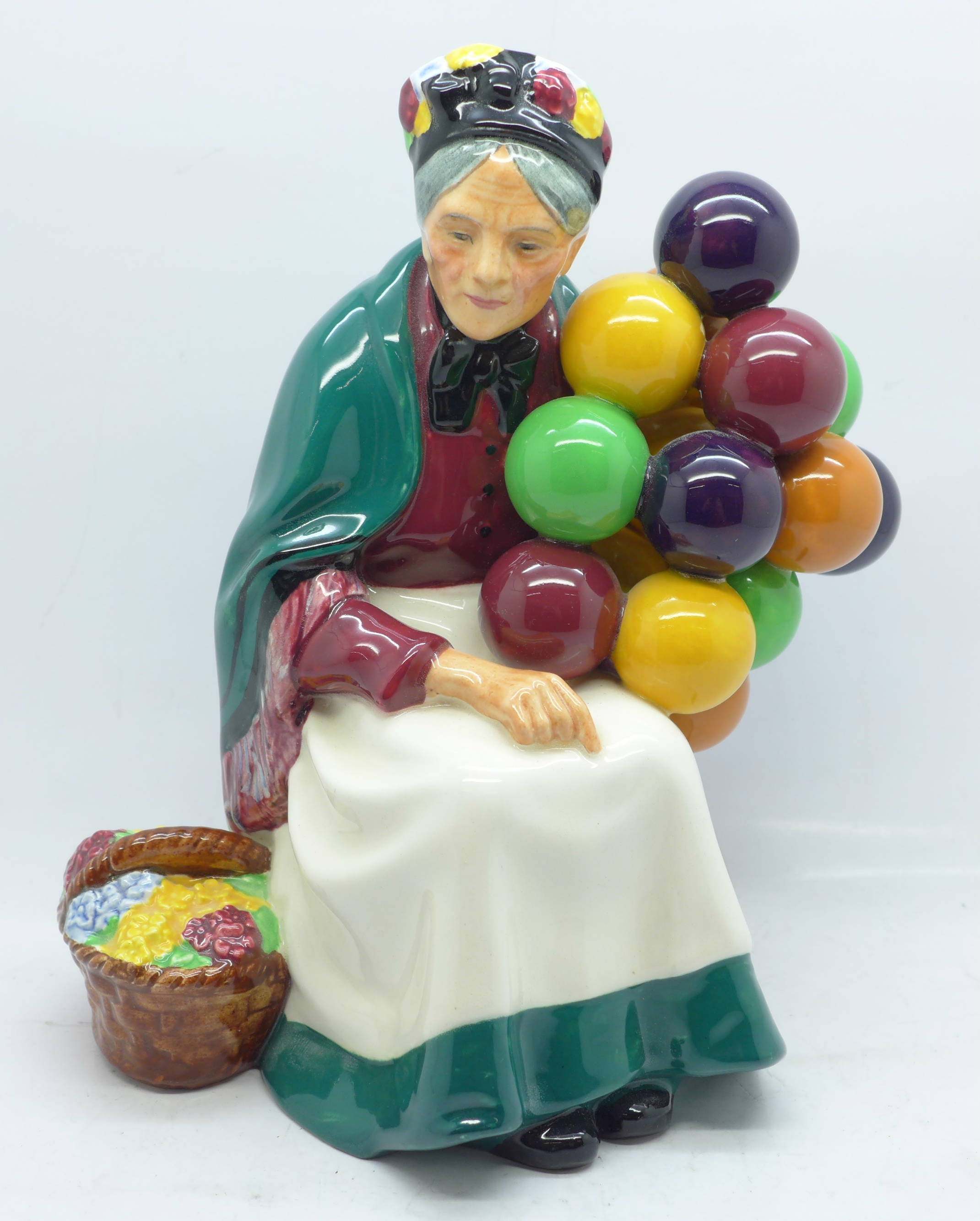 A Royal Doulton figure, The Old Balloon Seller