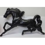 A chalk Black Horse wall plaque, 46cm