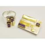 An Edinburgh designer silver and amethyst brooch with amethyst and gold set matching ring