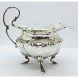 A silver jug, 79g