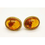 A pair of 9ct gold and amber ear studs, 3.9g