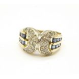 A 14ct gold, sapphire and diamond buckle ring, a/f, I