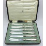 A set of six silver handled knives, by Walker & Hall