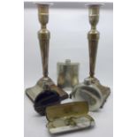 A pair of silver plated candlesticks, two hip flasks, a scent bottle and a pair of rolled gold