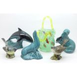 Three items of Poole Pottery including a dolphin, two Beswick bird figures, Whitethroat and Grey