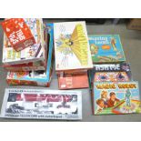 A collection of games including a Lima Toys Giant railway, Weaving Loom, Road Safety game, and